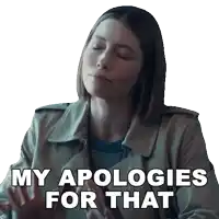 a woman in a trench coat with her eyes closed says " my apologies for that "