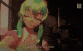 a girl with green hair and headphones says kimi no kokoro no naka nooite