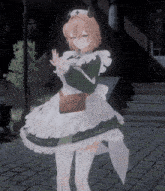 a girl in a maid costume is standing on a sidewalk