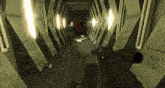 a person holding a gun in a tunnel with a flag on the wall