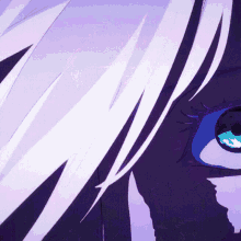 a close up of a person 's eye with white hair and blue eyes