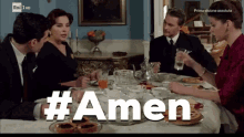 a group of people sitting around a table with #amen written on the bottom