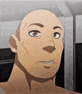 a close up of a man 's face with a bald head and brown eyes