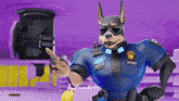 a cartoon police dog named dobs is pointing at something