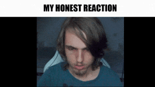 a picture of a man with a beard and the words my honest reaction