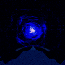 a picture of a blue galaxy with a white center