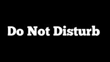a sign that says do not disturb on it