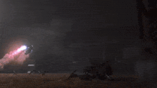a video game character is flying through the air with a rocket coming out of it .