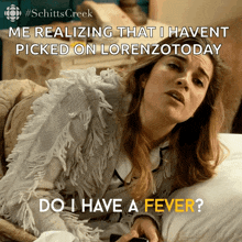 a woman laying on a bed with the caption " me realizing that i haven 't picked on lorenzo today "