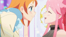 a girl with orange hair and a girl with pink hair kissing each other