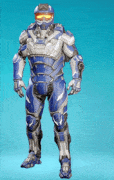 a man in a blue and silver armor with a helmet and goggles