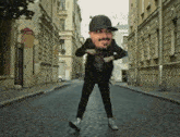 a man wearing a new york hat is dancing on a cobblestone street