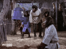 a group of monkeys are standing in a room with the words archives of the apes on the bottom right