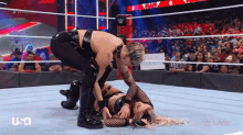 two women are wrestling in a ring with usa written on the bottom of the screen