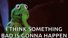 kermit the frog is holding his hand to his mouth and thinking about something bad is gonna happen .