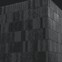 a black and white photo of a building with a few windows