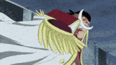 a man with a white beard and a red cape