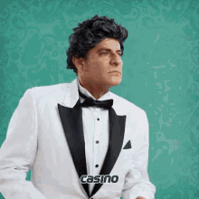 a man in a tuxedo with the word casino on the bottom right
