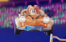 a cartoon character is driving a car on a race track .