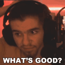a man wearing headphones with the words what 's good written below him