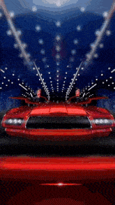 a red race car is driving through a tunnel of lights
