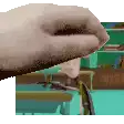 a close up of a person 's hand holding something in a pixel art .