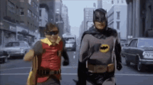 Batman And Robin Running Away GIF - Batman And Robin Running Away Run GIFs