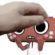 a person is petting a cartoon character 's head with their hand .
