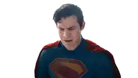 a man in a superman costume with a red cape