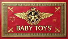 a red sign that says baby toys with a gold cherub on it