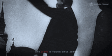 a black and white photo of a man with the words " and lenin is young once again " below him