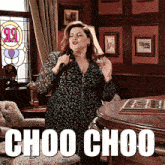 a woman singing into a microphone with the words choo choo written below her