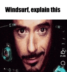 a close up of a man 's face with the words `` windsurf , explain this '' .