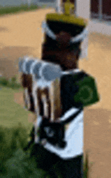 a minecraft character is standing in a field holding a sword .