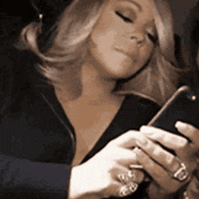 Mariah Carey Mariah Carey On Her Phone GIF - Mariah Carey Mariah Carey On Her Phone Mariah Carey Follow GIFs