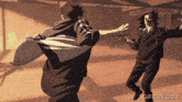 a gif from gifrun.com has two people dancing