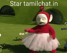 a teletubbies doll is wearing a pink tutu and has the words star tamilchat.in below her