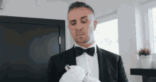 Keiran Lee In A Suit GIF - Keiran Lee In A Suit Reach In GIFs