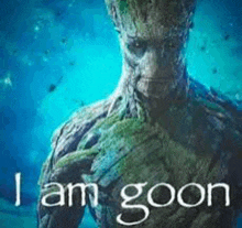 groot from the movie guardians of the galaxy is standing in front of a blue background and says `` i am goon '' .
