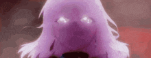a close up of a person 's face with purple eyes