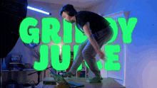 a man wearing headphones is dancing in front of a green sign that says grizzly juke