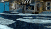 a blurred image of a city street with a few buildings