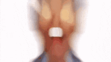a close up of a man 's face with a white ring around his mouth