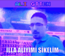 a purple and blue image of a man with the name ali gtten