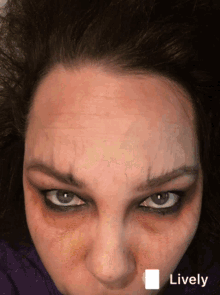 a close up of a woman 's face with a lively sticker
