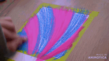 a person is painting on a piece of paper made in animotica