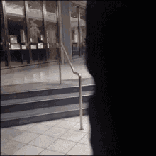 man walking through railing tall