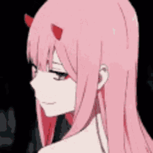 a close up of a girl with pink hair and red horns .