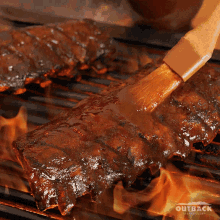Firey Barbecue At Outback Steakhouse GIF - Firey Barbecue Barbecue Ribs GIFs