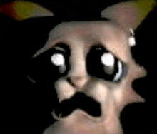 a close up of a cat 's face with big eyes